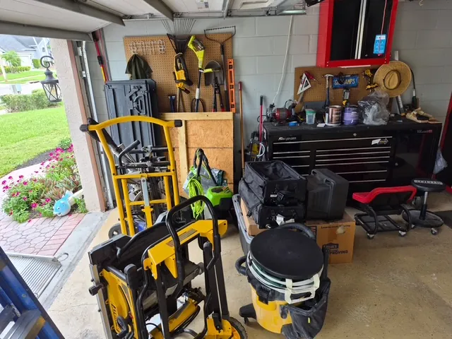 Garage cleanout before in Tampa, FL — cluttered, hard-to-use space