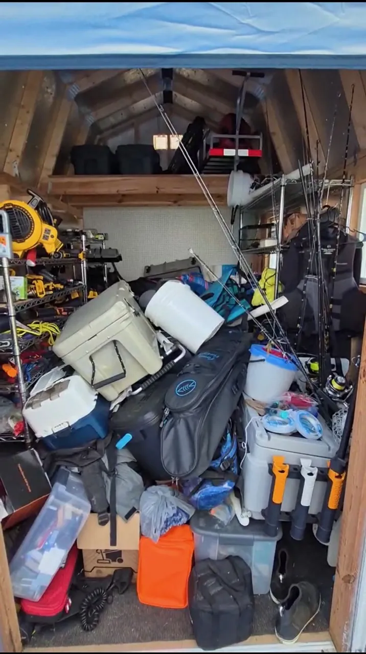 Shed organization before in Clearwater, FL — gear piled floor to ceiling
